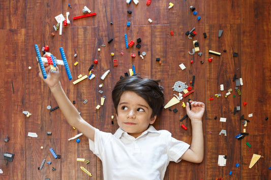 people playing with construction toys